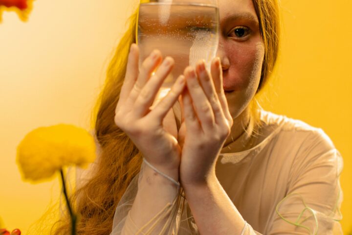 Photo by Yaroslav Shuraev: https://www.pexels.com/photo/a-pretty-woman-holding-a-glass-jar-7699830/